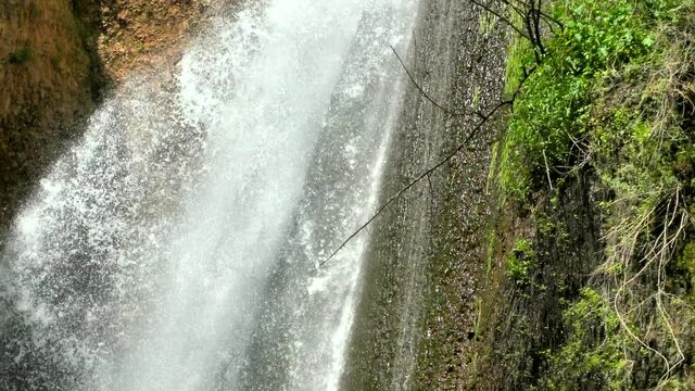 Tanur or Oven Waterfall (21 m) in Ayoun Nature Reserve, by the town of Metula, Upper Galilee, Israel. 4K