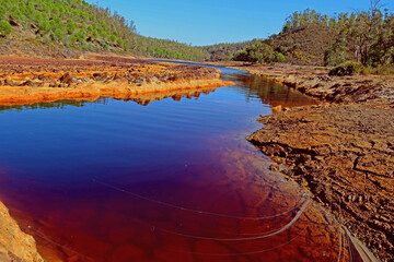 Rio Tinto in the province of Huelva (Spain) with reddish waters due to pollution