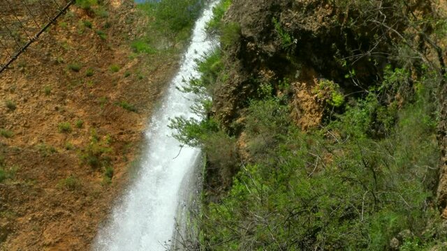Tanur or Oven Waterfall (21 m) in Ayoun Nature Reserve, by the town of Metula, Upper Galilee, Israel. 4K