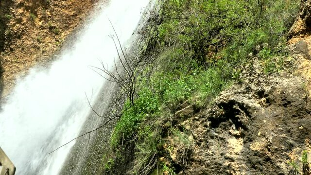 Tanur or Oven Waterfall (21 m) in Ayoun Nature Reserve, by the town of Metula, Upper Galilee, Israel. 4K