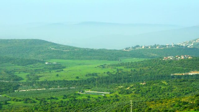 Panorama of the Upper Galilee hills surrounding town Metula. Northern Israel. 4K