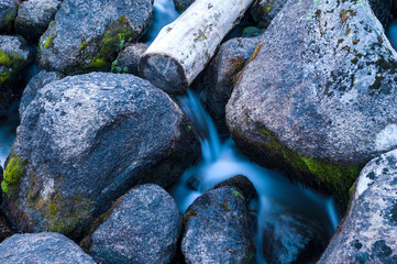 Taiga. Siberia. Ergaki. Mountain stream flowing from the lake 