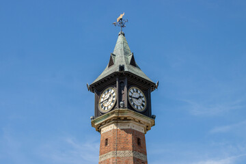 The British seaside town of Skegness in the East Lindsey a district of Lincolnshire, England, showing the an old towner on a roundabout