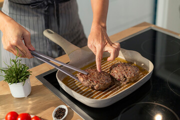 A close-up view of grilling burgers
