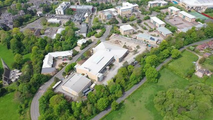 Aerial footage of the large University of York in the City of York in North Yorkshire, UK Academic teaching and research institution, founded 1963 modern campus and colleges.