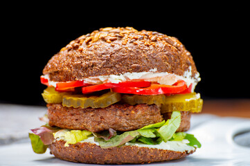 Grilled plant based, meat free vega burgers close up