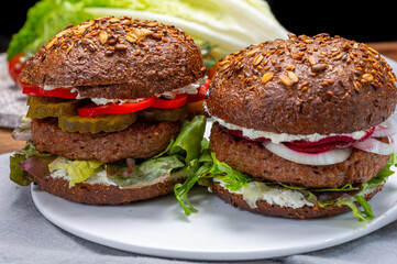 Grilled plant based, meat free vega burgers close up
