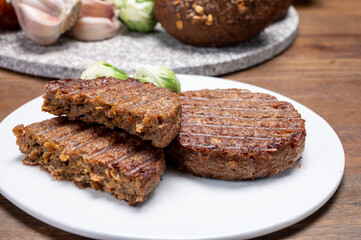 Grilled plant based, meat free vega burgers close up
