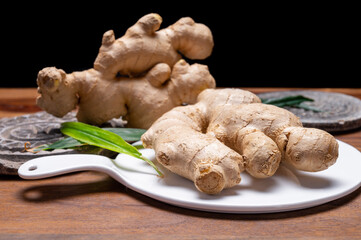 Fresh ginger rhizome root used in traditional medicines and for flavoring meals worldwide.
