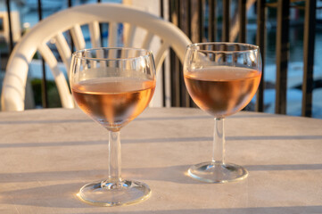 Drinking of local rose wine in summer Provence, France