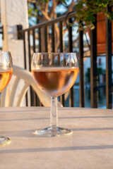Drinking of local rose wine in summer Provence, France