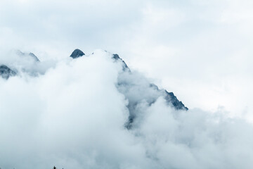 Naklejka na ściany i meble Clouds in the alps