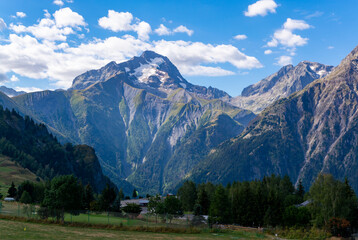 Obraz premium View on ski station Les deux Alpes and Alpine mountains peaks in summer, Isere, France