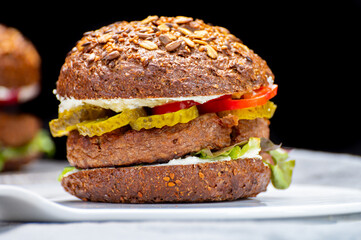 Grilled plant based, meat free vega burgers close up
