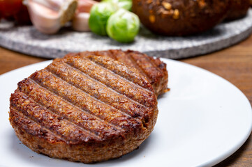 Grilled plant based, meat free vega burgers close up