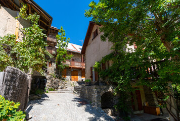 Fototapeta na wymiar Small medieval village Venosc in French Alps, Ecrins mountain range, Isere, France