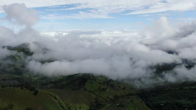 Aerial shot of mountains and clouds