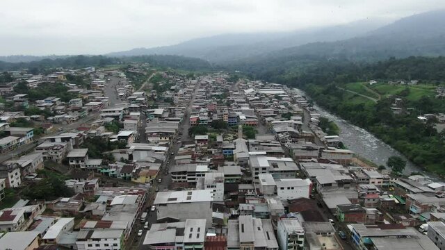 Echeand&iacute;a - Ecuador  04-04-2020: aerial shot of small town on the green forest of Ecuador
