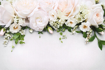 Delicate blossoming white and light pink rose frame, blooming flowers pastel festive background, soft bouquet floral card, toned	