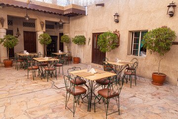 Fototapeta na wymiar Small cafe in the Al Fahidi Historical District in Dubai, UAE
