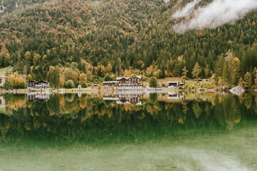 Scenery lake with beautiful water reflection and trees autumn colors