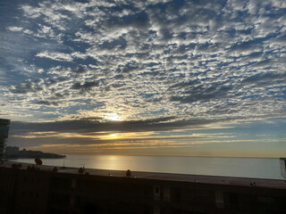 Obraz premium beautiful and colorful sunrise in the beach with some clouds