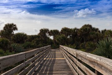 Fototapeta na wymiar wooden bridge near the beach