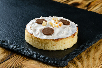 sweet tartlet dessert on a stone tray