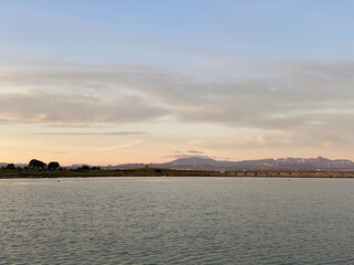 Beautiful and colorful sunset with cloud in the beach