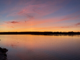 Beautiful and colorful sunset with cloud in the beach
