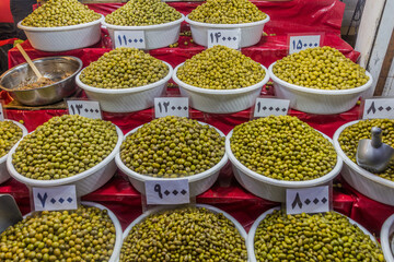 Various types of olives for sale at the bazaar in Rasht, Iran