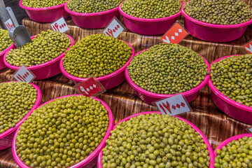 Various types of olives for sale at the bazaar in Rasht, Iran