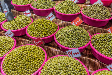 Various types of olives for sale at the bazaar in Rasht, Iran
