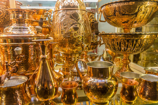 ZANJAN, IRAN - APRIL 13, 2018: Brass objects for sale in a shop in Zanjan, Iran.