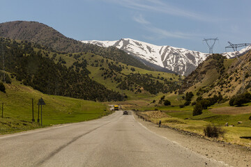 Fototapeta na wymiar Road M34 in Turkestan mountain Range in Tajikistan