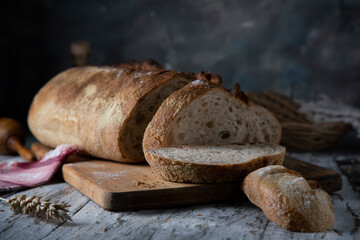 
Fresh sliced ​​bread on rustic wooden table