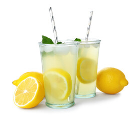 Natural lemonade with mint and fresh fruits on white background. Summer refreshing drink