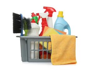 Basket with different cleaning products and tools on white background