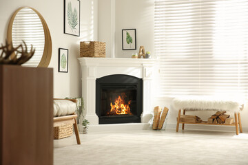 Bright living room interior with artificial fireplace and firewood - obrazy, fototapety, plakaty