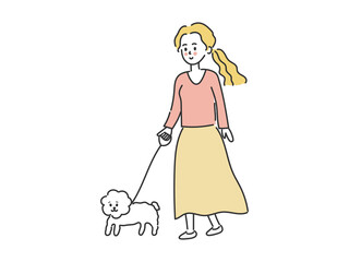 Young woman walking with dog