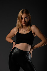 Sexy blonde in leather black pants going crazy.