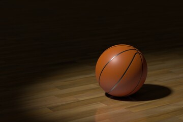 Obraz premium スポットライトで照らされたバスケットボール