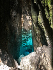 Deep hole, impressiv spring of Soca River with crystal clear turquoise blue water. Kranjska Gora,...