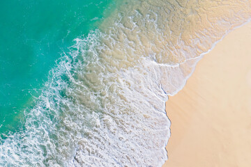 Waves breaking on the beach, aerial view