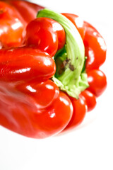 Organic red bell pepper from the orchard on white background