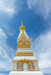 Prathat Phranom pagoda with blue sky background and soft cloud at nakorn pranom, Thailand