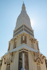 Prathat Uthen pagoda with sunshine behigh it, at Nakorn Phanom, Thailand