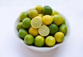 Fresh limes isolated on white background.