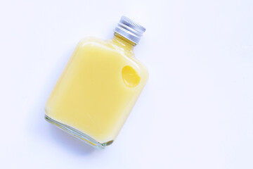 Bottle of sweet corn juice on white background.