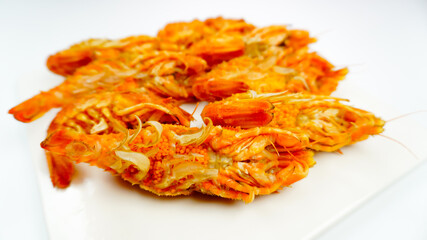 Bear Shrimps (Sclerocrangon salebrosa, Wild Russian Shrimp) on a white plate